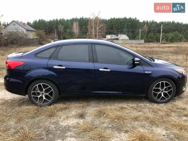 Синій Форд Фокус, об'ємом двигуна 2 л та пробігом 148 тис. км за 9800 $, фото 4 на Automoto.ua