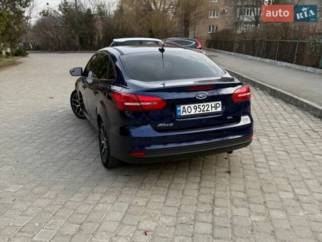Синій Форд Фокус, об'ємом двигуна 2 л та пробігом 111 тис. км за 9000 $, фото 34 на Automoto.ua