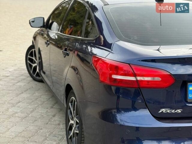 Синій Форд Фокус, об'ємом двигуна 2 л та пробігом 111 тис. км за 9000 $, фото 25 на Automoto.ua