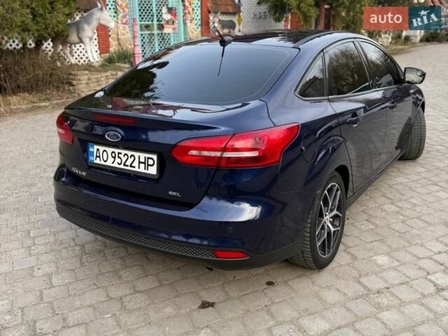 Синій Форд Фокус, об'ємом двигуна 2 л та пробігом 111 тис. км за 9000 $, фото 28 на Automoto.ua