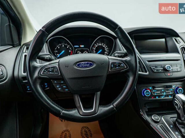 Синий Форд Фокус, объемом двигателя 1.5 л и пробегом 112 тыс. км за 10283 $, фото 11 на Automoto.ua