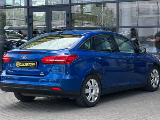 Синий Форд Фокус, объемом двигателя 1 л и пробегом 71 тыс. км за 8990 $, фото 5 на Automoto.ua