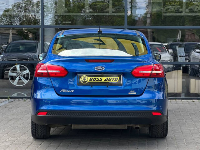 Синий Форд Фокус, объемом двигателя 1 л и пробегом 71 тыс. км за 8990 $, фото 4 на Automoto.ua