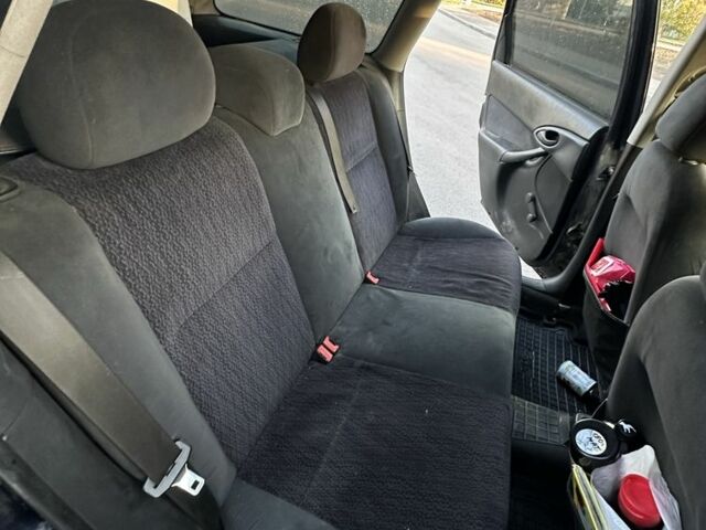 Синій Форд Фокус, об'ємом двигуна 1.6 л та пробігом 390 тис. км за 3000 $, фото 12 на Automoto.ua