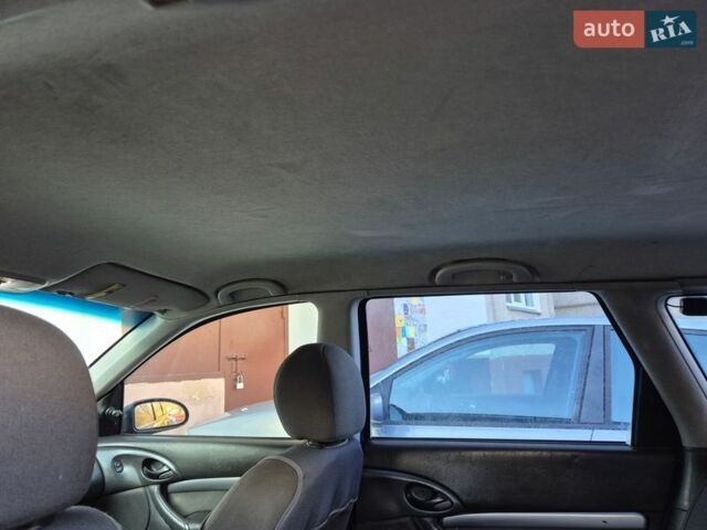 Синий Форд Фокус, объемом двигателя 1.8 л и пробегом 392 тыс. км за 2500 $, фото 30 на Automoto.ua