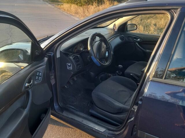 Синий Форд Фокус, объемом двигателя 1.6 л и пробегом 389 тыс. км за 999 $, фото 5 на Automoto.ua