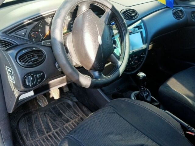 Синий Форд Фокус, объемом двигателя 1.8 л и пробегом 410 тыс. км за 2600 $, фото 5 на Automoto.ua