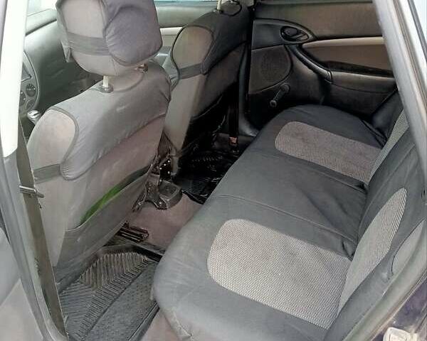 Синій Форд Фокус, об'ємом двигуна 1.6 л та пробігом 340 тис. км за 2600 $, фото 4 на Automoto.ua