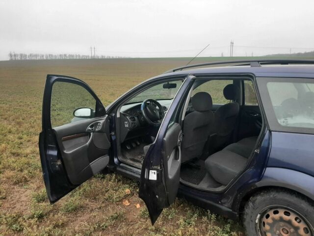 Синий Форд Фокус, объемом двигателя 1.6 л и пробегом 390 тыс. км за 1100 $, фото 4 на Automoto.ua