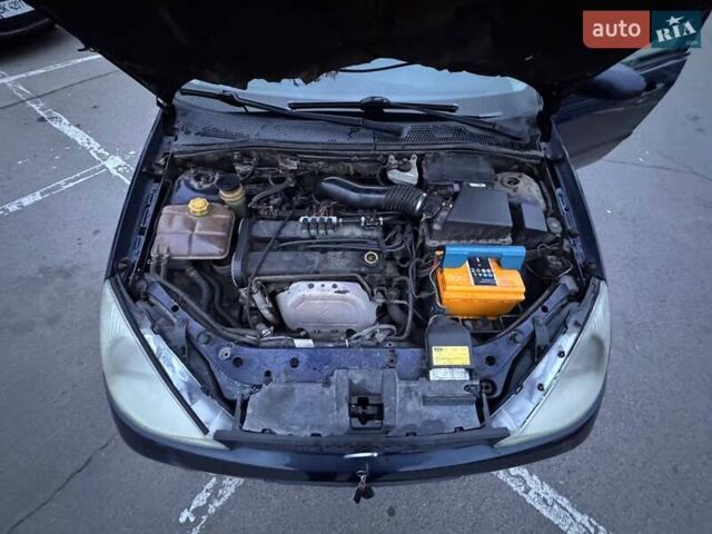 Синий Форд Фокус, объемом двигателя 1.8 л и пробегом 250 тыс. км за 2500 $, фото 10 на Automoto.ua