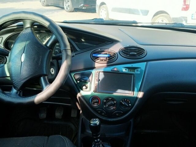 Синий Форд Фокус, объемом двигателя 1.8 л и пробегом 410 тыс. км за 2600 $, фото 6 на Automoto.ua