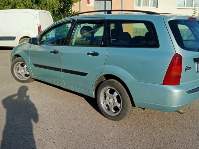 Синий Форд Фокус, объемом двигателя 1.8 л и пробегом 410 тыс. км за 2600 $, фото 2 на Automoto.ua