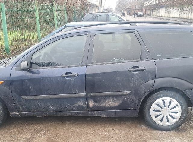Синій Форд Фокус, об'ємом двигуна 1 л та пробігом 482 тис. км за 927 $, фото 3 на Automoto.ua