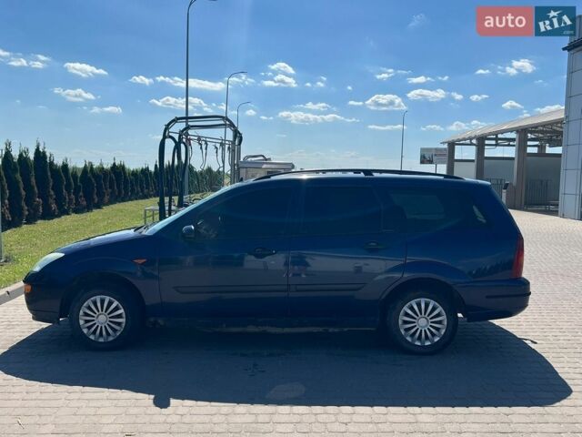 Синий Форд Фокус, объемом двигателя 1.8 л и пробегом 210 тыс. км за 1650 $, фото 2 на Automoto.ua