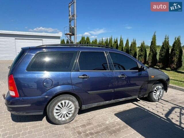 Синий Форд Фокус, объемом двигателя 1.8 л и пробегом 210 тыс. км за 1650 $, фото 1 на Automoto.ua