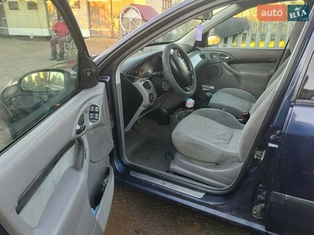 Синий Форд Фокус, объемом двигателя 1.8 л и пробегом 300 тыс. км за 2650 $, фото 4 на Automoto.ua