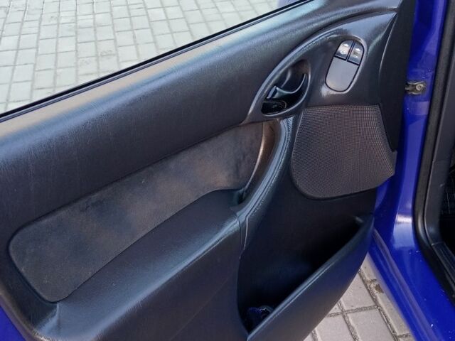 Синий Форд Фокус, объемом двигателя 1.8 л и пробегом 425 тыс. км за 3600 $, фото 16 на Automoto.ua