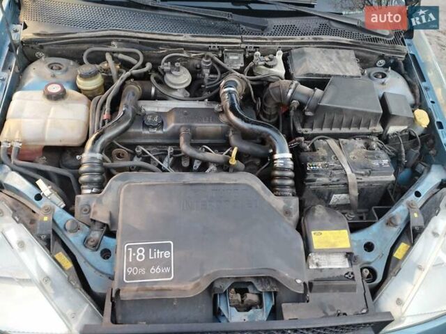 Синий Форд Фокус, объемом двигателя 1.8 л и пробегом 326 тыс. км за 2800 $, фото 12 на Automoto.ua