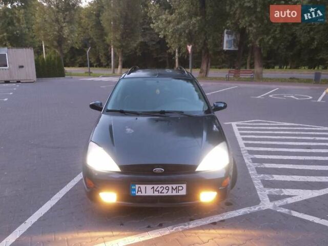 Синий Форд Фокус, объемом двигателя 1.8 л и пробегом 250 тыс. км за 2700 $, фото 10 на Automoto.ua