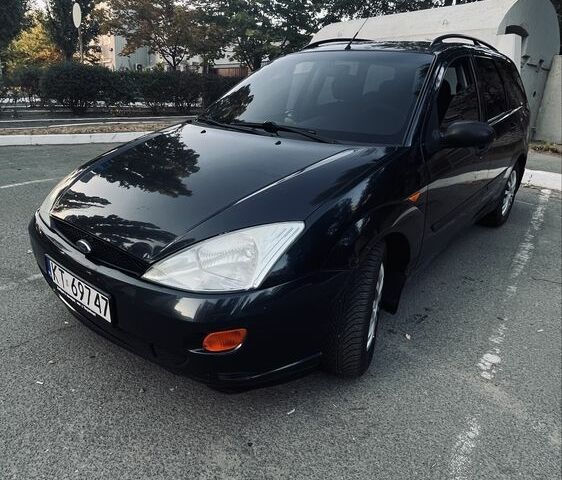 Синий Форд Фокус, объемом двигателя 1.8 л и пробегом 300 тыс. км за 1500 $, фото 7 на Automoto.ua