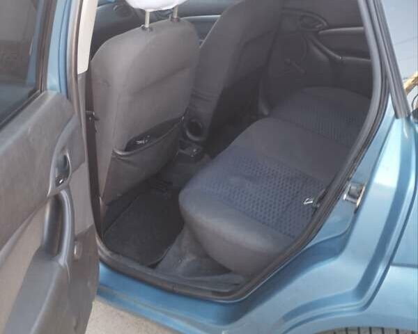 Синий Форд Фокус, объемом двигателя 1.8 л и пробегом 326 тыс. км за 2800 $, фото 10 на Automoto.ua