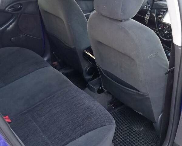 Синій Форд Фокус, об'ємом двигуна 1.8 л та пробігом 374 тис. км за 2850 $, фото 12 на Automoto.ua