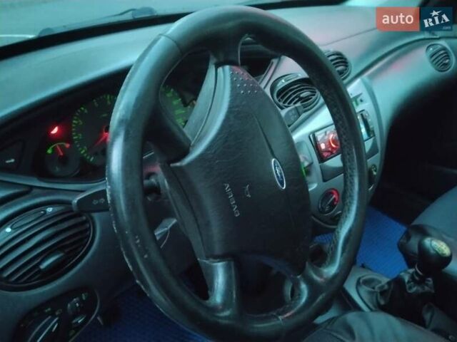 Синий Форд Фокус, объемом двигателя 1.8 л и пробегом 250 тыс. км за 2700 $, фото 16 на Automoto.ua