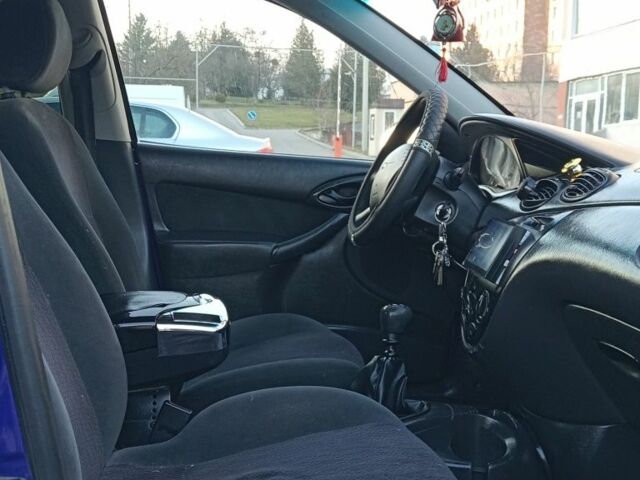 Синий Форд Фокус, объемом двигателя 1.8 л и пробегом 425 тыс. км за 3600 $, фото 20 на Automoto.ua