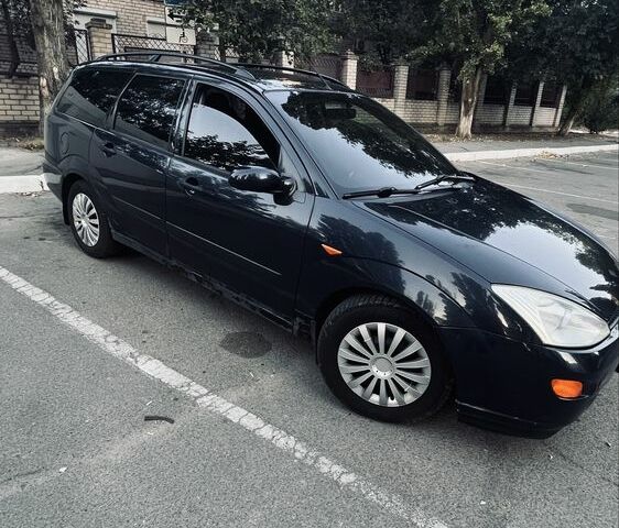 Синий Форд Фокус, объемом двигателя 1.8 л и пробегом 300 тыс. км за 1500 $, фото 3 на Automoto.ua