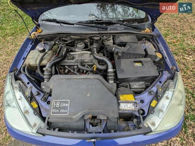 Синий Форд Фокус, объемом двигателя 1.8 л и пробегом 426 тыс. км за 2500 $, фото 4 на Automoto.ua
