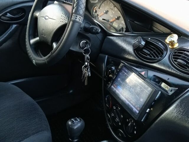 Синий Форд Фокус, объемом двигателя 1.8 л и пробегом 425 тыс. км за 3600 $, фото 19 на Automoto.ua