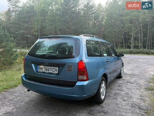 Синий Форд Фокус, объемом двигателя 1.8 л и пробегом 320 тыс. км за 2000 $, фото 2 на Automoto.ua