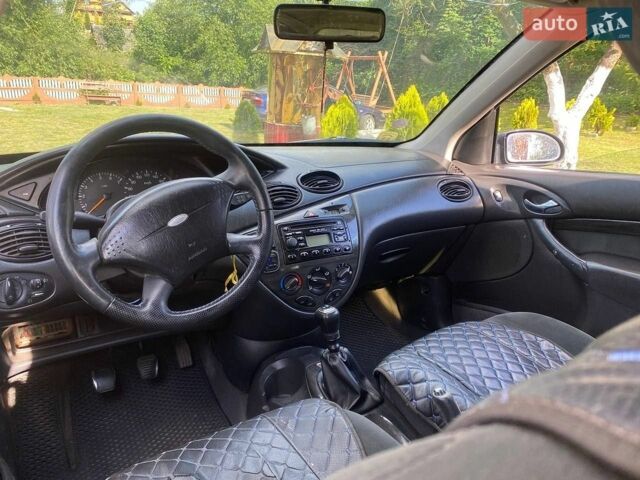 Синій Форд Фокус, об'ємом двигуна 1.8 л та пробігом 376 тис. км за 1500 $, фото 10 на Automoto.ua