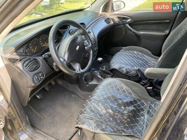 Синій Форд Фокус, об'ємом двигуна 1.8 л та пробігом 376 тис. км за 1500 $, фото 12 на Automoto.ua