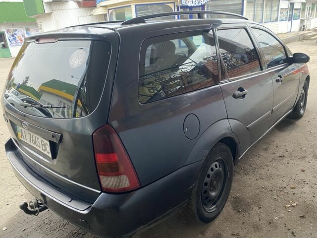 Синий Форд Фокус, объемом двигателя 1.6 л и пробегом 414 тыс. км за 2500 $, фото 14 на Automoto.ua