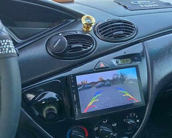 Синій Форд Фокус, об'ємом двигуна 1.8 л та пробігом 374 тис. км за 2850 $, фото 8 на Automoto.ua