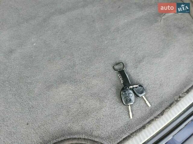 Синий Форд Фокус, объемом двигателя 1.8 л и пробегом 300 тыс. км за 2650 $, фото 9 на Automoto.ua