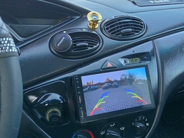 Синий Форд Фокус, объемом двигателя 1.8 л и пробегом 425 тыс. км за 3600 $, фото 21 на Automoto.ua