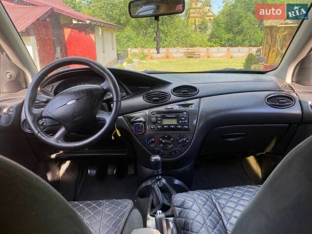 Синій Форд Фокус, об'ємом двигуна 1.8 л та пробігом 376 тис. км за 1500 $, фото 11 на Automoto.ua