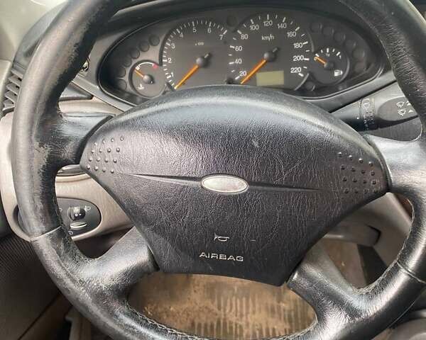 Синий Форд Фокус, объемом двигателя 1.8 л и пробегом 200 тыс. км за 527 $, фото 2 на Automoto.ua