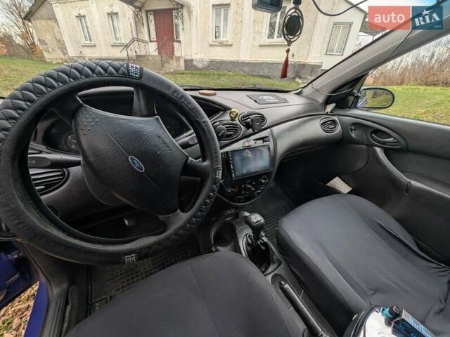 Синий Форд Фокус, объемом двигателя 1.8 л и пробегом 426 тыс. км за 2500 $, фото 3 на Automoto.ua