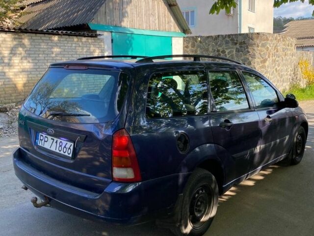 Синій Форд Фокус, об'ємом двигуна 1.8 л та пробігом 317 тис. км за 1100 $, фото 3 на Automoto.ua