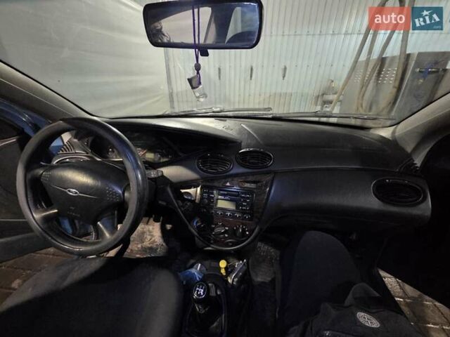 Синий Форд Фокус, объемом двигателя 1.8 л и пробегом 349 тыс. км за 2000 $, фото 3 на Automoto.ua