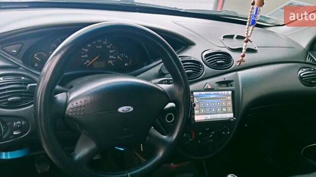 Синий Форд Фокус, объемом двигателя 1.39 л и пробегом 370 тыс. км за 2000 $, фото 4 на Automoto.ua