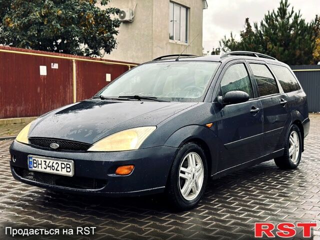 Синий Форд Фокус, объемом двигателя 1.8 л и пробегом 300 тыс. км за 2450 $, фото 2 на Automoto.ua