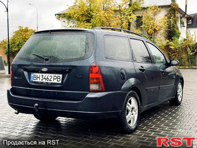 Синий Форд Фокус, объемом двигателя 1.8 л и пробегом 300 тыс. км за 2450 $, фото 4 на Automoto.ua