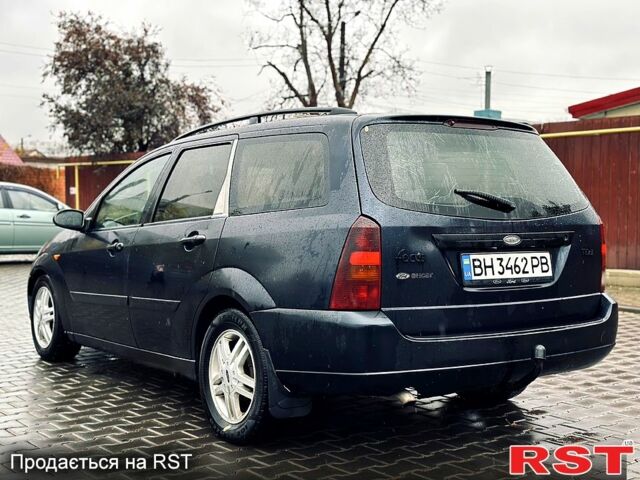 Синий Форд Фокус, объемом двигателя 1.8 л и пробегом 300 тыс. км за 2450 $, фото 5 на Automoto.ua