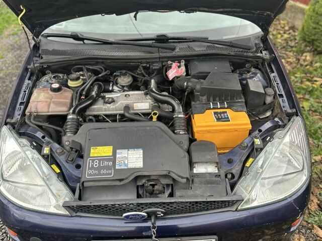 Синий Форд Фокус, объемом двигателя 1.8 л и пробегом 300 тыс. км за 1300 $, фото 4 на Automoto.ua