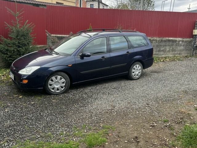 Синий Форд Фокус, объемом двигателя 1.8 л и пробегом 300 тыс. км за 1300 $, фото 1 на Automoto.ua