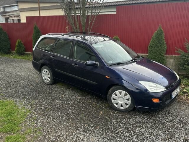 Синий Форд Фокус, объемом двигателя 1.8 л и пробегом 300 тыс. км за 1300 $, фото 3 на Automoto.ua